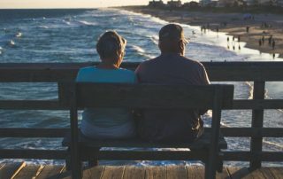 elderly couple by the beach to illustrate Lazos Matchmaking Agency