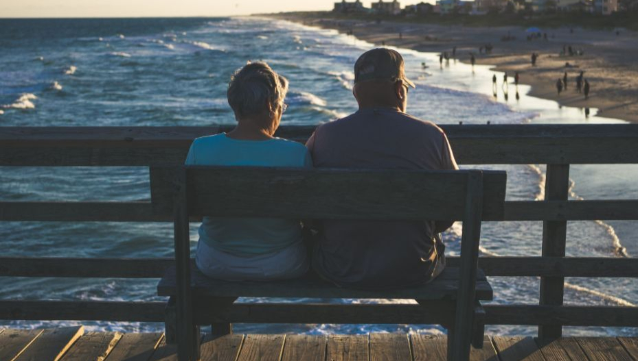 elderly couple by the beach to illustrate Lazos Matchmaking Agency