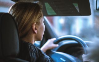 Woman driving car to illustrate new matchmaking tactic