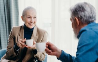 older woman and man having coffee to illustrate speed dating for the elderly