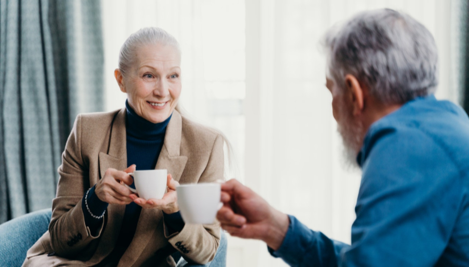 older woman and man having coffee to illustrate