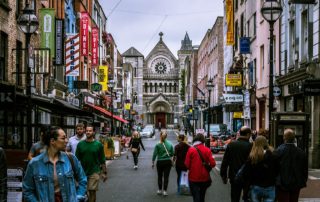 pedestrians in a street in dublin to illustrate irish matchmakers