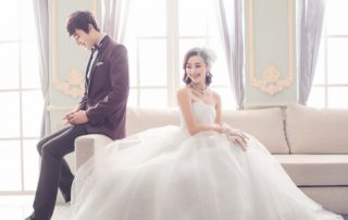 korean couple in wedding attire to illustrate matchmaking services for koreans