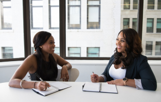 two women working to illustrate carpedm