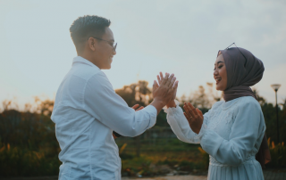 a couple holding hands to illustrate indonesian matchmaking