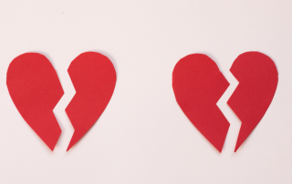 two cracked hearts to illustrate unlucky daters