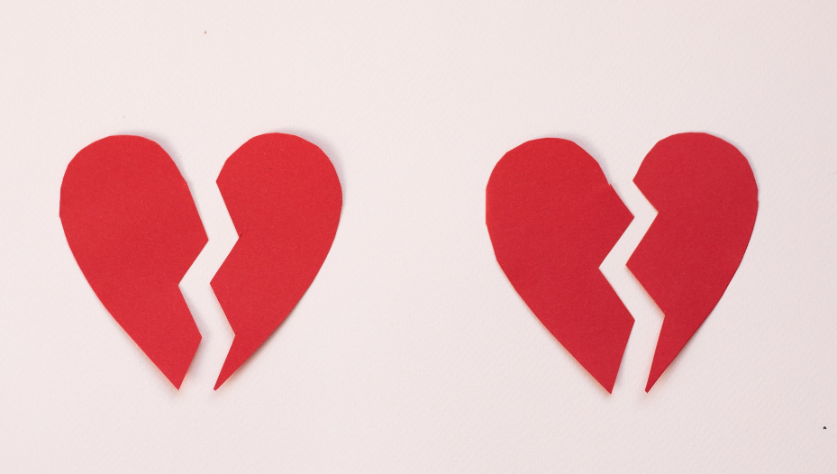 two cracked hearts to illustrate unlucky daters