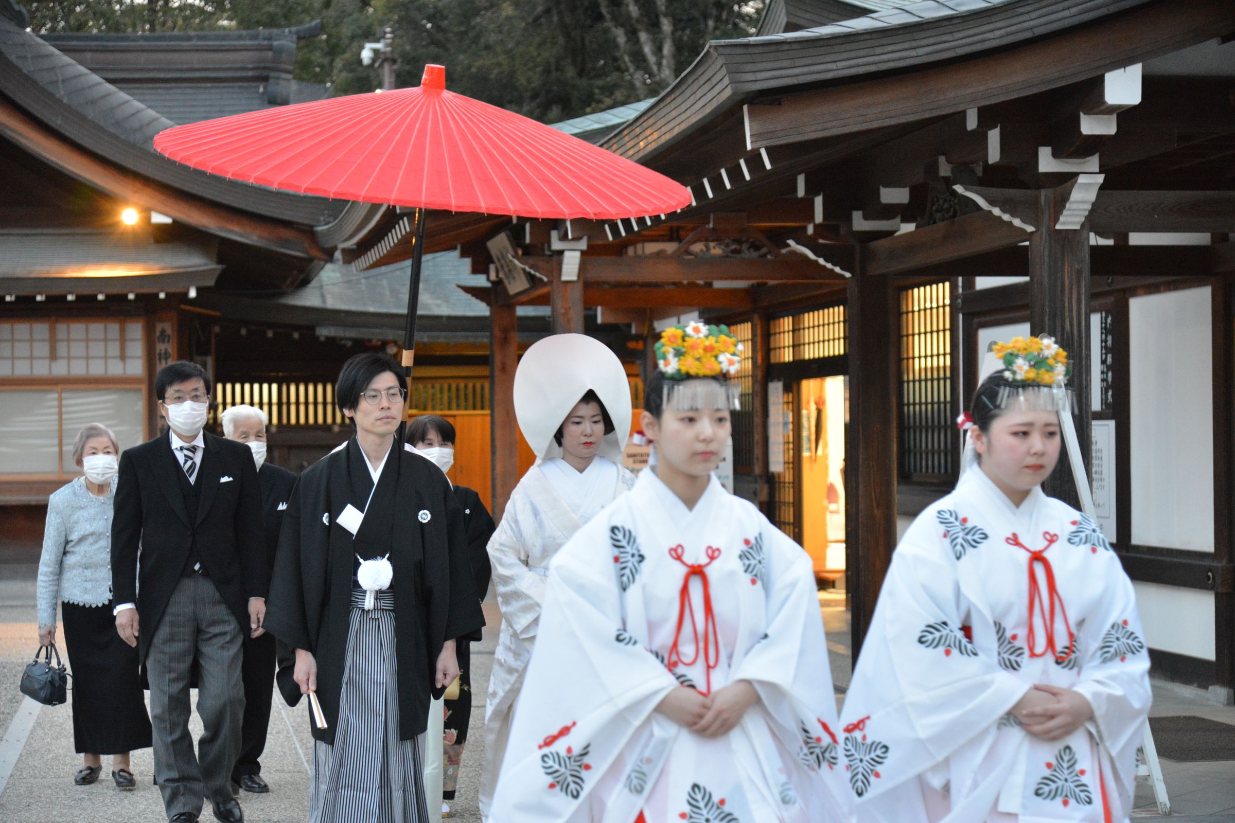 Shinto wedding procession in traditional attire at a shrine in Nara, Japan