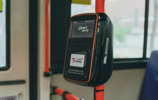 Close-up of a public transportation payment machine inside a bus in Seoul, South Korea.