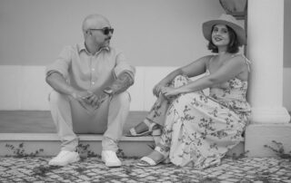 Charming black and white portrait of a couple relaxing outdoors in Palmela, Portugal.