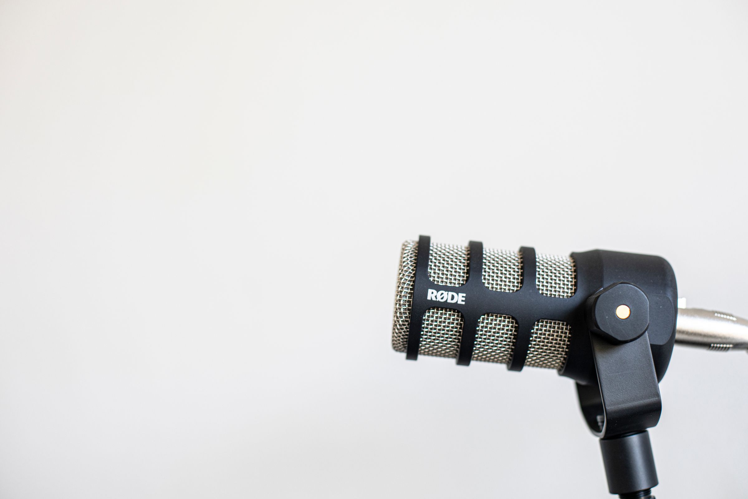 Studio microphone against a plain background