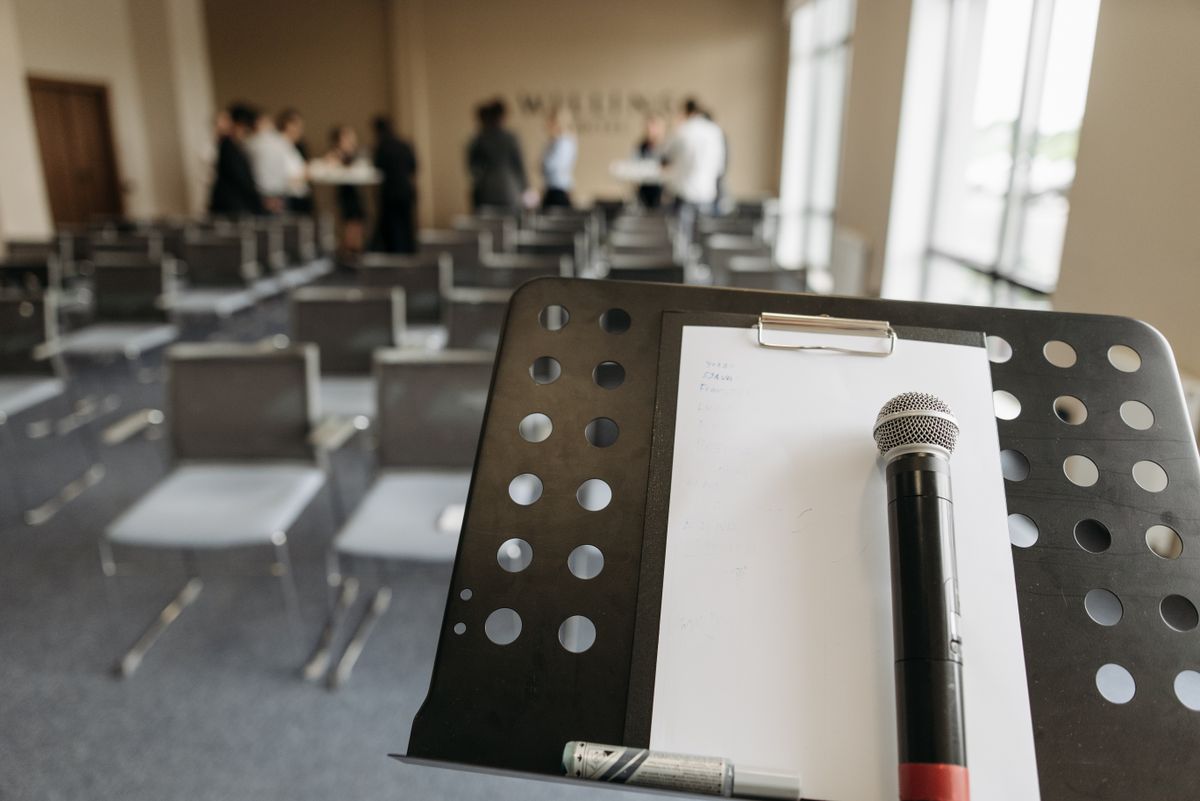 Microphone on a stand in a conference room before a session